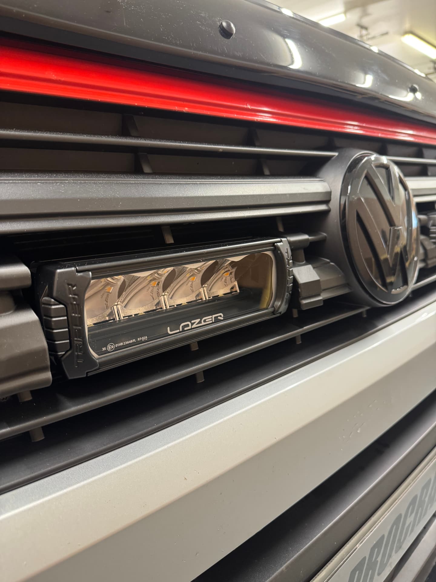 Lazer LED light bar fitted behind the grille of a VW commercial van
